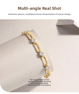Macro detail of gold S925 sterling silver chain bracelet with moissanite stones