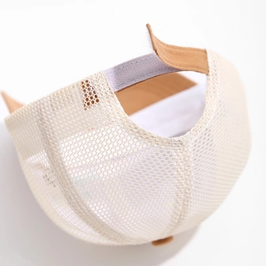Detail of baby bear baseball cap showing breathable mesh and adjustable brown strap