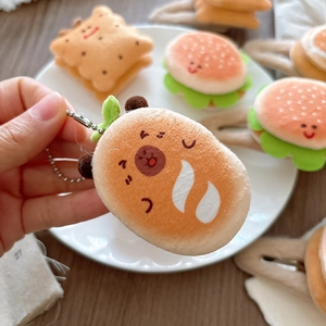 Plush 3D toast charm with cute face and metal chain, cartoon food accessory for bags