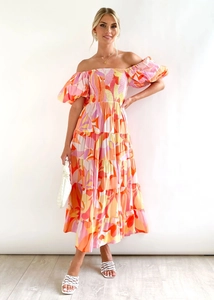 Detail of off-shoulder puff sleeve floral maxi dress with colorful tiered ruffle skirt