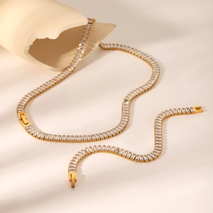 Golden tennis jewelry set with rectangular zircons including necklace and bracelet