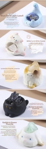 Detailed set of cute resin animals paired with natural crystals like lapis and quartz