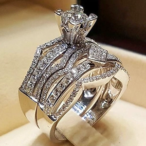 Luxurious bridal ring set with square zircon and micro-pave diamonds on beige cushion