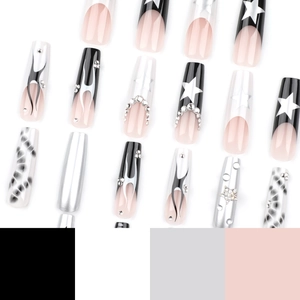 Y2K long coffin press-on nails with black flame, silver chrome stars, and rhinestone accents
