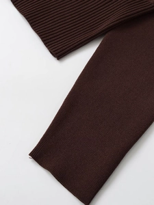 Close-up of dark brown ribbed knit cuff with high-quality texture and tight stitching