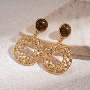 Vintage hollow gold mesh hoop earrings featuring natural tiger eye stone accents