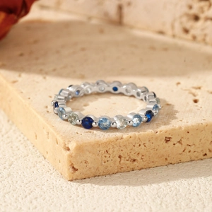 S925 sterling silver ring featuring a gradient of blue and white round cut crystals