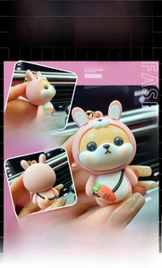 Pink rabbit-themed Shiba Inu keychain with a small carrot accessory and gold metal hook