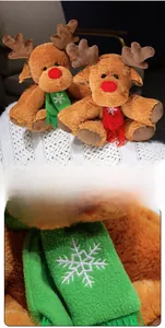 Detail display of Christmas reindeer plush with snowflake embroidery on festive scarves