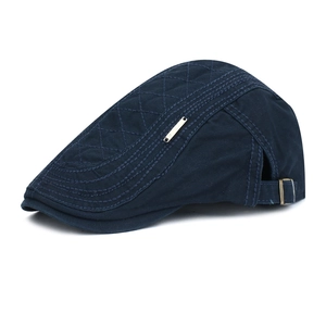 Classic navy cotton beret hat with diamond stitching and adjustable metal strap