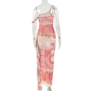 Detail of artistic print and side pleat design on the back of this long maxi dress