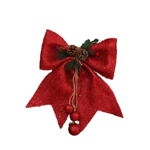 Red glitter Christmas bow with pine cones and berries for holiday tree decoration