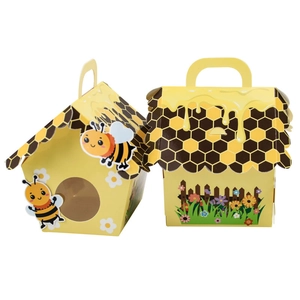 Bee-themed yellow cardboard gift box with honeycomb patterns and hive shape for favors