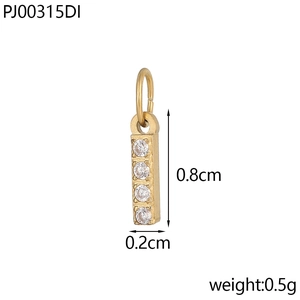 Close-up of gold bar pendant with four round clear crystals and dimension specifications
