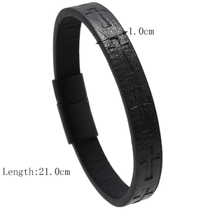 Close-up of black braided leather bracelet with cross pattern and magnetic clasp detail