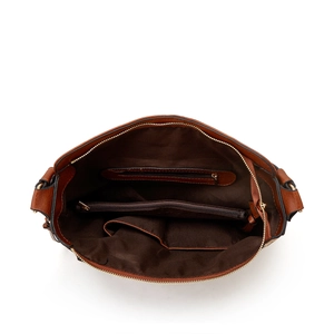 Top view of brown PU leather tote interior with main zipper compartment and pocket details