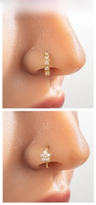 Detailed comparison of golden nose rings with flower and star-shaped zircon inlays