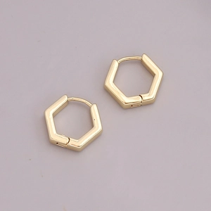 Minimalist 18K gold hexagonal geometric hoop earrings with polished metal finish