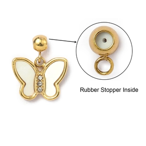 Detail of golden butterfly pendant with white shell inlay and rubber stopper feature
