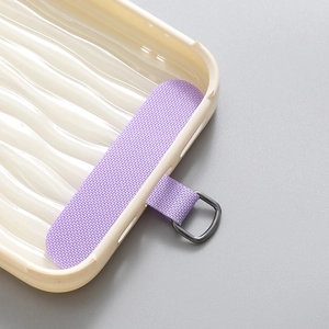 Universal cream phone case gasket with wavy texture and purple braided strap