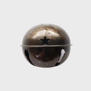 Detail of 8cm bronze metal Christmas bell with star cutouts for tree decoration
