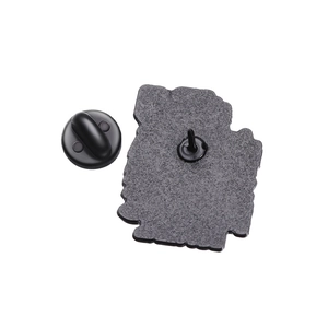 Close-up of the black metal brooch back featuring a durable black rubber clutch fastener