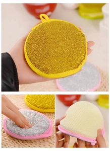 Detail of round gold, silver wire scourers and yellow sponge with hanging loops