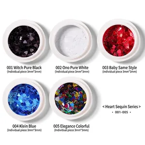 3mm heart-shaped holographic nail sequins in five colors including black and red