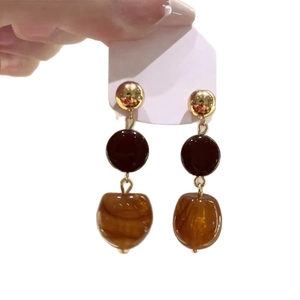 Retro amber and dark resin bead drop earrings with golden metal studs for women