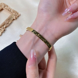 Polished rose gold stainless steel heart bracelet engraved with I Love You and Forever