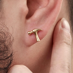 Golden hammer shaped stainless steel stud earring for men worn on earlobe