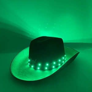 Detail shot of black cowboy hat with bright green LED lights on the brim for night parties