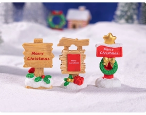 Miniature Christmas road signs set with Merry Christmas text and snowy bases