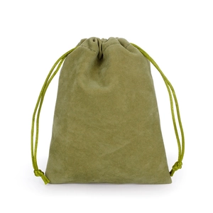 Detail view of grass green drawstring velvet pouch with soft suede texture and matching cord
