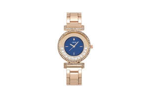 Detail of rose gold fashion watch with blue dial and crystals on the bezel and dial