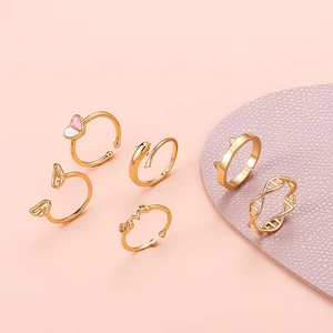 6pcs set of golden open rings featuring heart, wings and butterfly designs for women