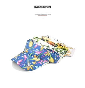 Detail showing various tropical floral patterns on summer canvas sun visors for women
