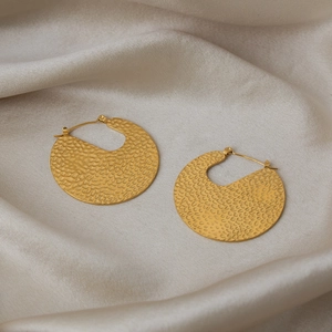 Chic 18K gold plated hammered texture hoop earrings displayed on elegant silk fabric
