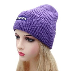 Purple thick knit beanie for winter with OTHEFOCUS square logo patch on front