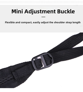 Detail shot of the adjustable plastic buckle and durable woven strap on black travel backpack