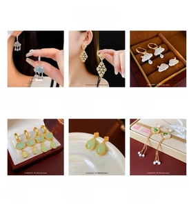 Detailed view of silver needle earrings featuring zircon, pearl and 14K gold plating