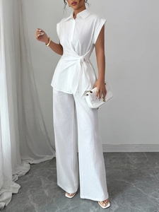 Elegant white sleeveless linen blend top and wide-leg trousers set with drawstring waist