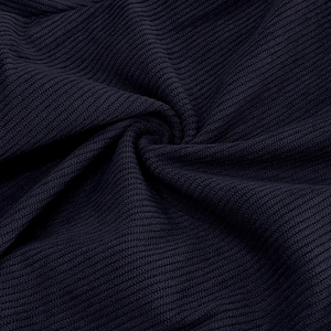 Detailed macro view showing the textured navy blue waffle knit fabric and soft material quality