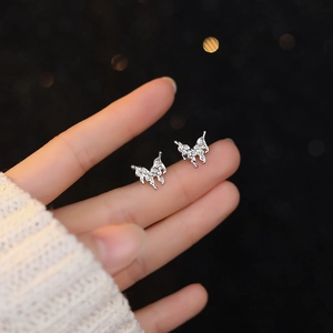 Minimalist S999 sterling silver lava butterfly stud earrings with irregular texture