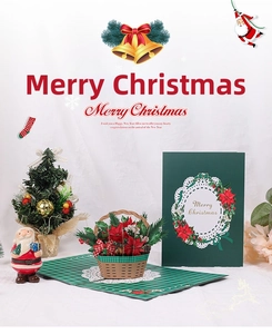 Detailed 3D pop-up Christmas card featuring a festive flower basket with Merry Christmas text
