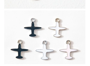 Detailed view of alloy airplane charms with colorful enamel finish for DIY jewelry
