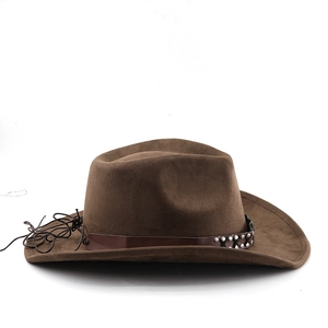 Detailed close-up of brown suede cowboy hat featuring leather band with silver rivets