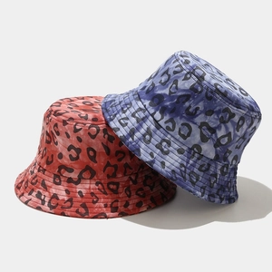 Leopard print cotton bucket hats in red and blue colors for sun protection