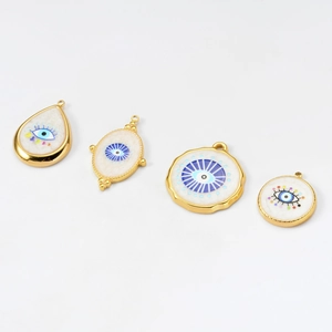 White enamel Evil Eye gold charms in assorted geometric shapes for DIY jewelry making