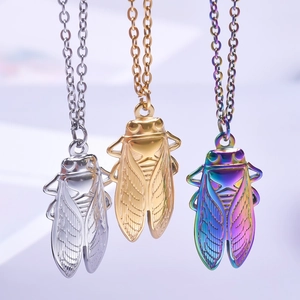 Detailed cicada pendants in gold, silver and rainbow colors with delicate wing textures